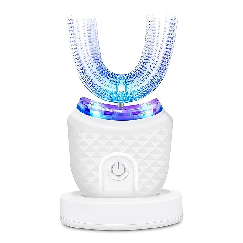 White dental device with blue light on a white background
