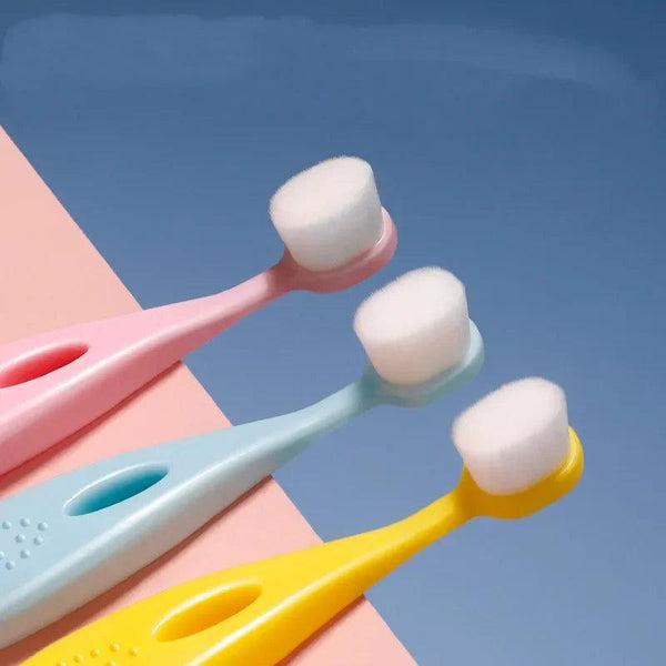 Ultra-soft toothbrush for children, designed with a comfortable grip and gentle bristles for a safe brushing experience