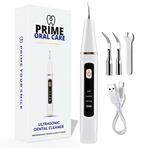 Prime Oral Care ultrasonic dental cleaner with packaging, attachments, and USB cable on a white background.